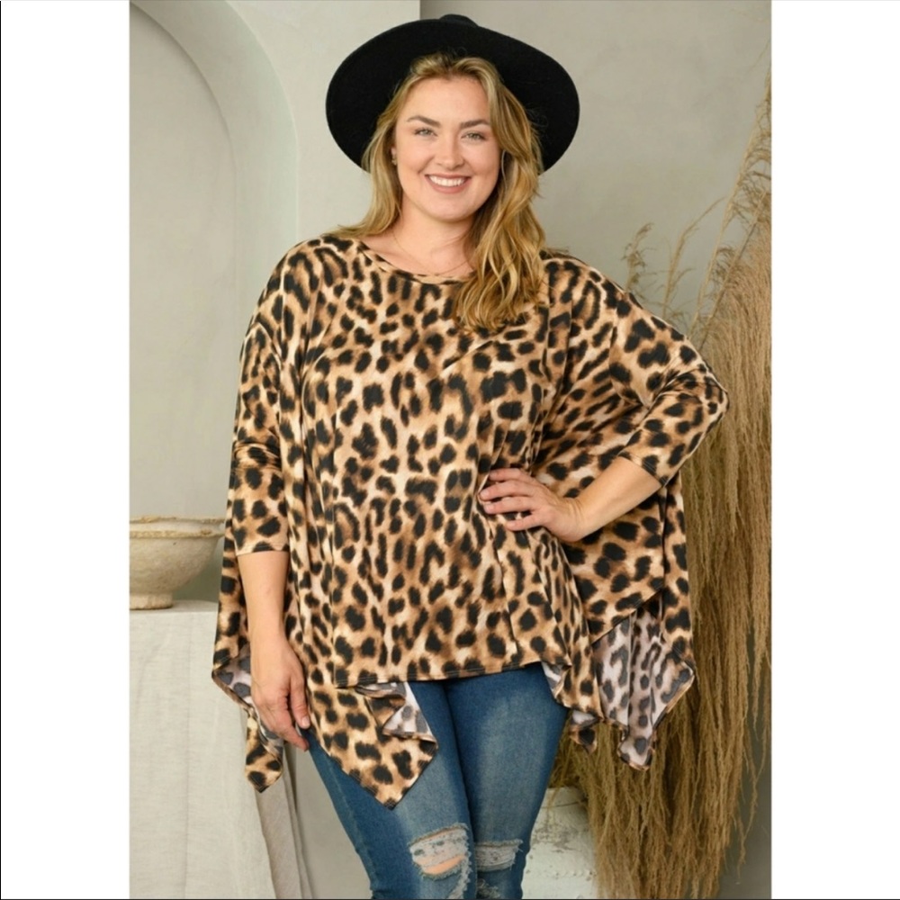 NWT PLUS SIZE (2X/3X) animal print asymmetrical top. VERY FLATTERING!! - Picture 4 of 5